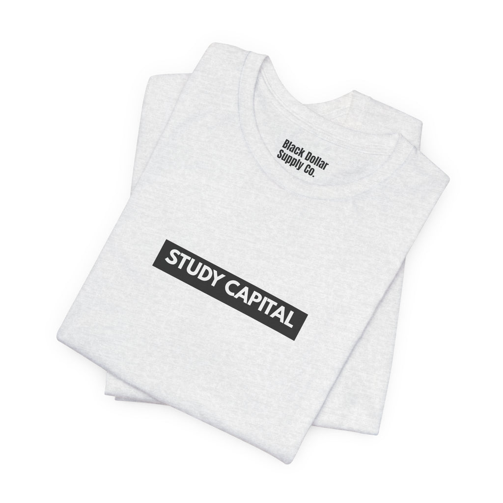 Study Capital Tee — Most chase money. We study how it moves.